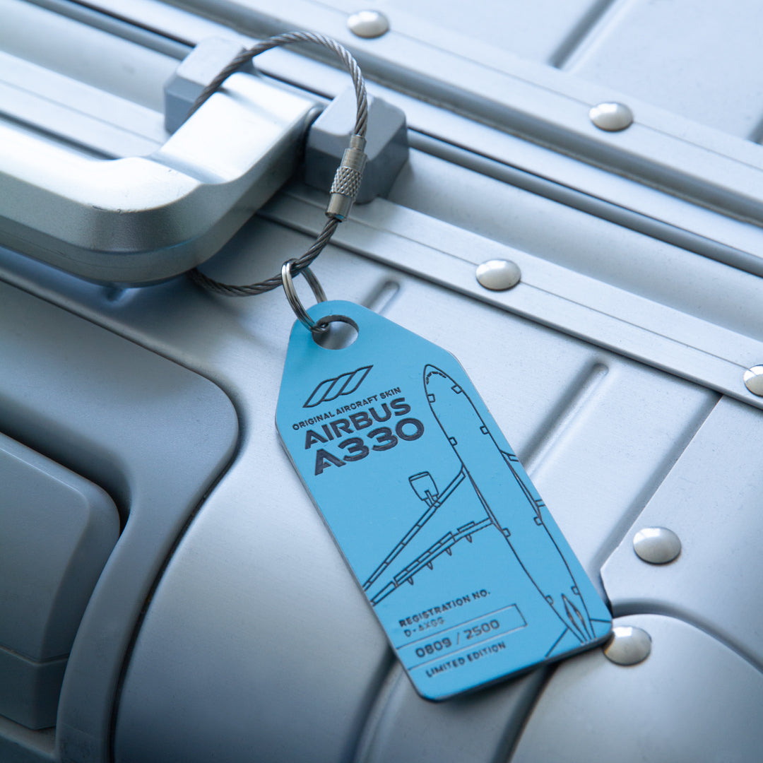 Aviationtag Airbus A330 D-AXGG Eurowings and Turkish Airlines Edition - Mood Photo of the light blue variation aircraft tag  on a suitcase