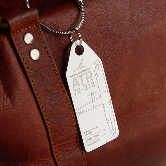 Aviationtag ATR 72 D4-CBU aircraft tag Edition TACV Cabo Verde Airlines - Mood photo white aircraft tag on bag