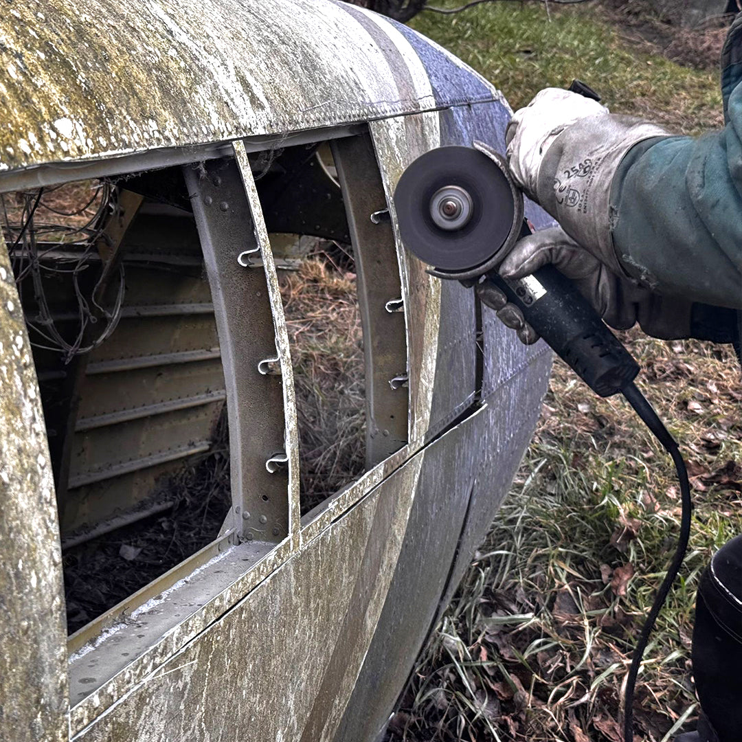Cutting original aircraft fuselage panels from DHC-6 Twin Otter MSN 46 to create limited edition Aviationtags made from upcycled aircraft material
