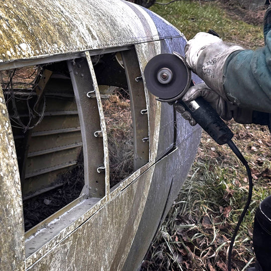 Cutting original aircraft fuselage panels from DHC-6 Twin Otter MSN 46 to create limited edition Aviationtags made from upcycled aircraft material