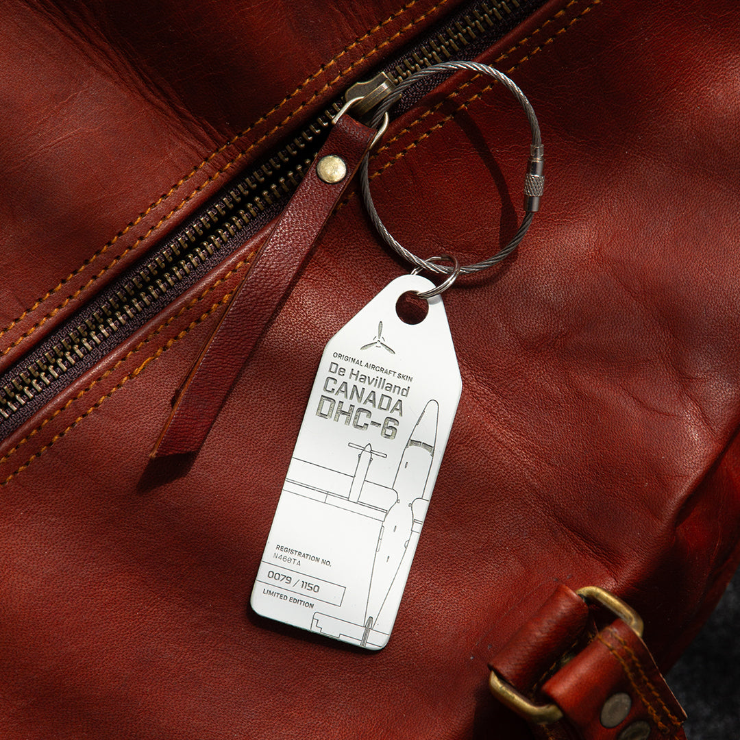 White Aviationtag Twin Otter tag used as a travel accessory and bag tag, made from original airplane skin, collectible aviation memorabilia