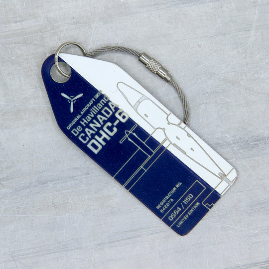 Aviationtag created from museum-exhibited Twin Otter aircraft, featuring aircraft registration and model engraving