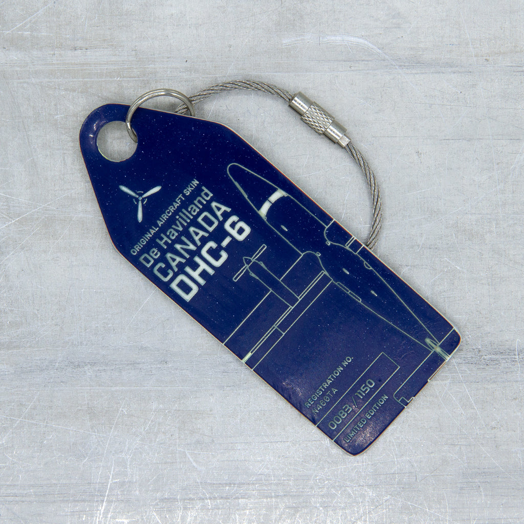 Detail of aircraft skin texture on Aviationtag Twin Otter tag, upcycled aircraft fuselage material with visible patina