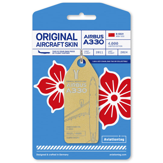 Aviationtag made from China Southern Airbus A330-200 B-6531 fuselage – upcycled aircraft skin, limited edition plane tag, aviation memorabilia. Golden aircraft tag with cardboard packaging.