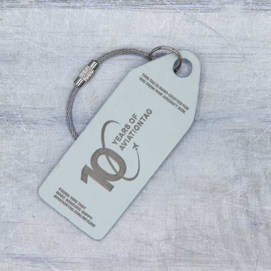 10 Years of Aviationtag - Airbus A318 YR-ASA aircraft tag edition ex Tarom. Image shows the backside of the plane tag with the 10 years anniversary logo