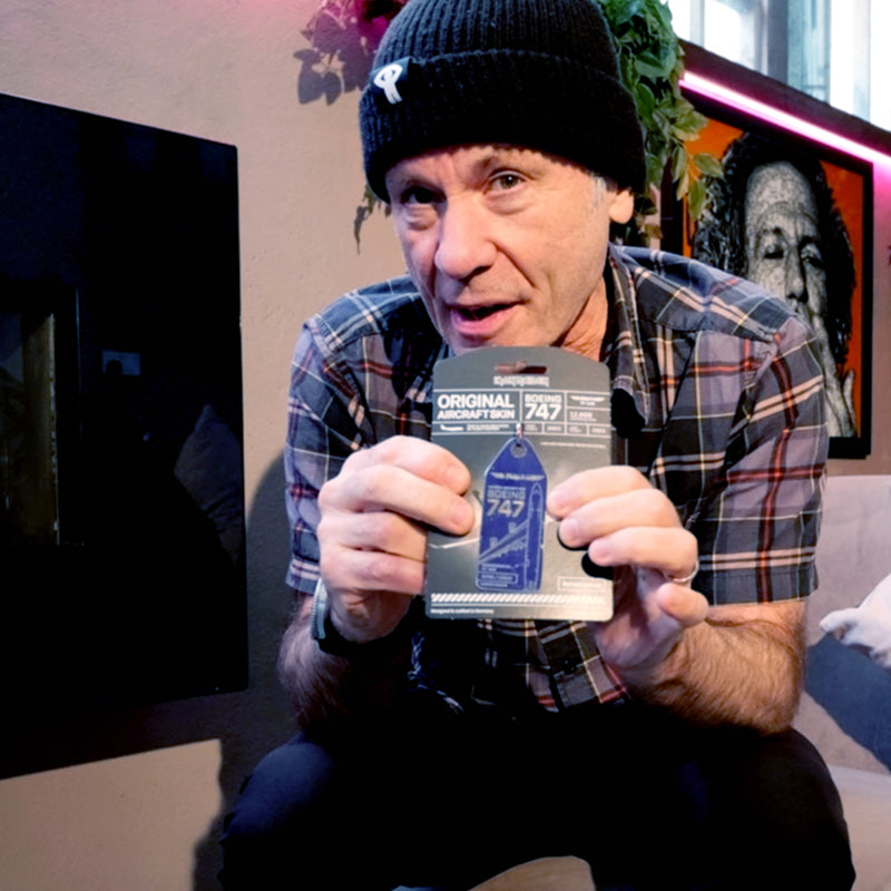 Iron Maiden singer Bruce Dickinson showing the blue Ed Force One Aviationtag