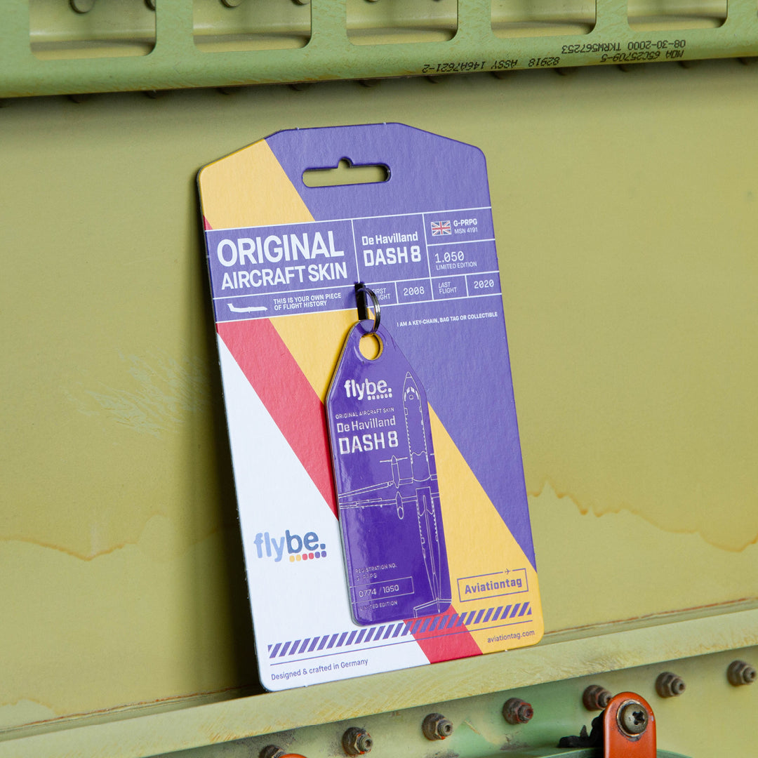 Aviationtag Flybe Tribute Edition Dash 8 Q400 G-PRPG Aircraft Tag Edition - Photo of plane tag with cardboard on aircraft panel