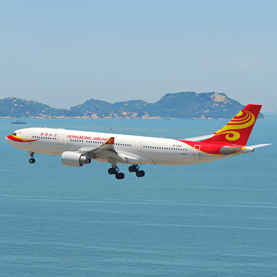 Airbus A330-223 B-LNF Hong Kong Airlines in flight; widebody aircraft later dismantled and upcycled into Aviationtag plane tags.