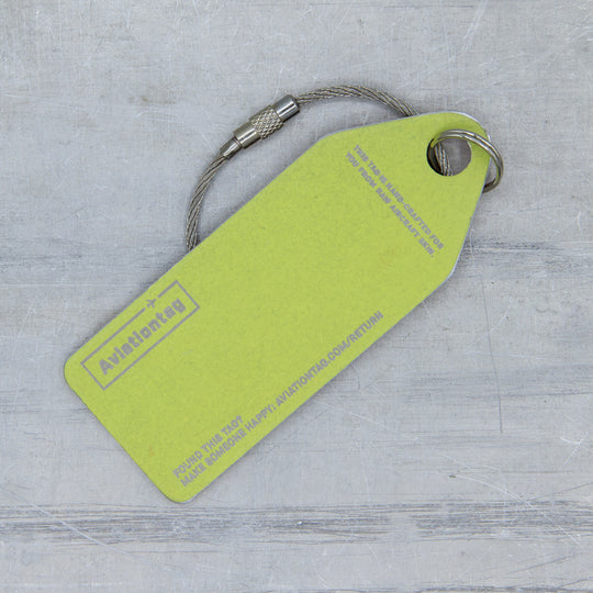 Aviationtag made from original aircraft skin of Airbus A330-223 B-LNF (Hong Kong Airlines); limited edition aviation tag with engraved serial number. Backside of the tag.