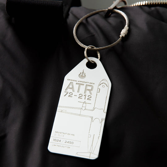 Aviationtag Edition Hunnu Air ATR 72-212 2-JUCE Aircraft Tag White on a black bag as a baggage tag