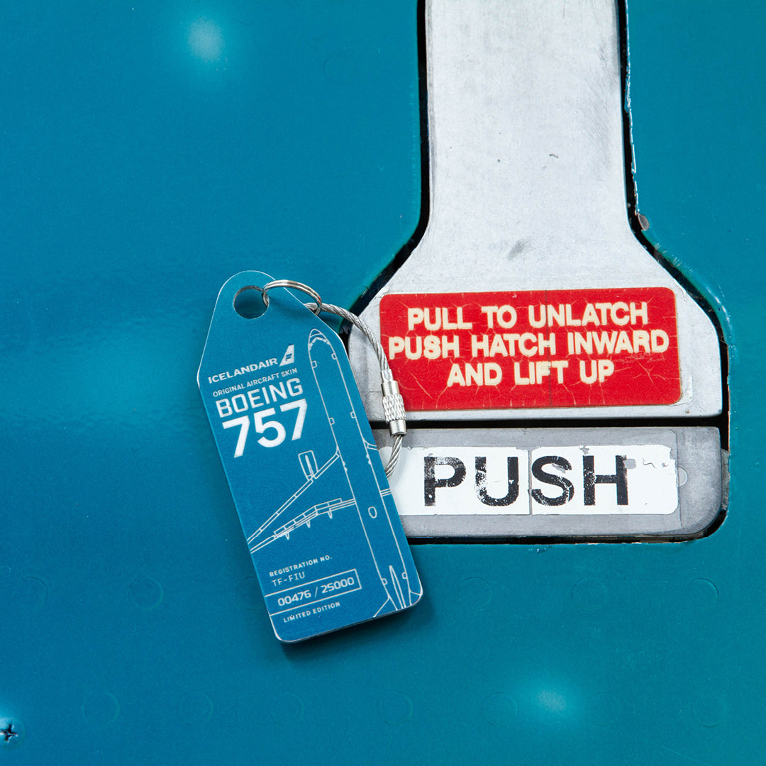 Aviationtag x Icelandair Hekla Aurora Boeing 757 TF-FIU Edition - petrol variant of aircraft tag on plane emergency door